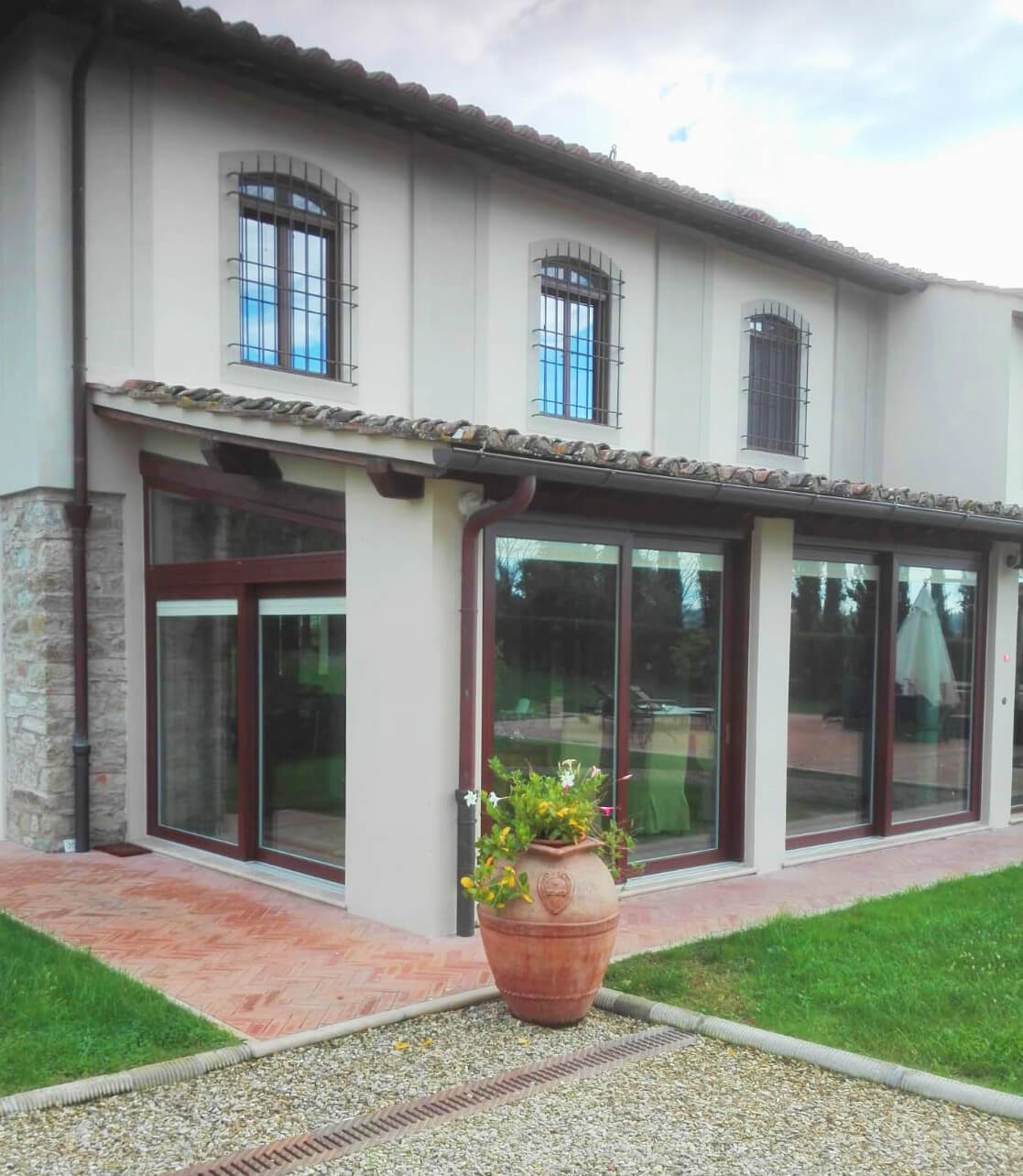 Vetrate scorrevoli villa in legno-alluminio
